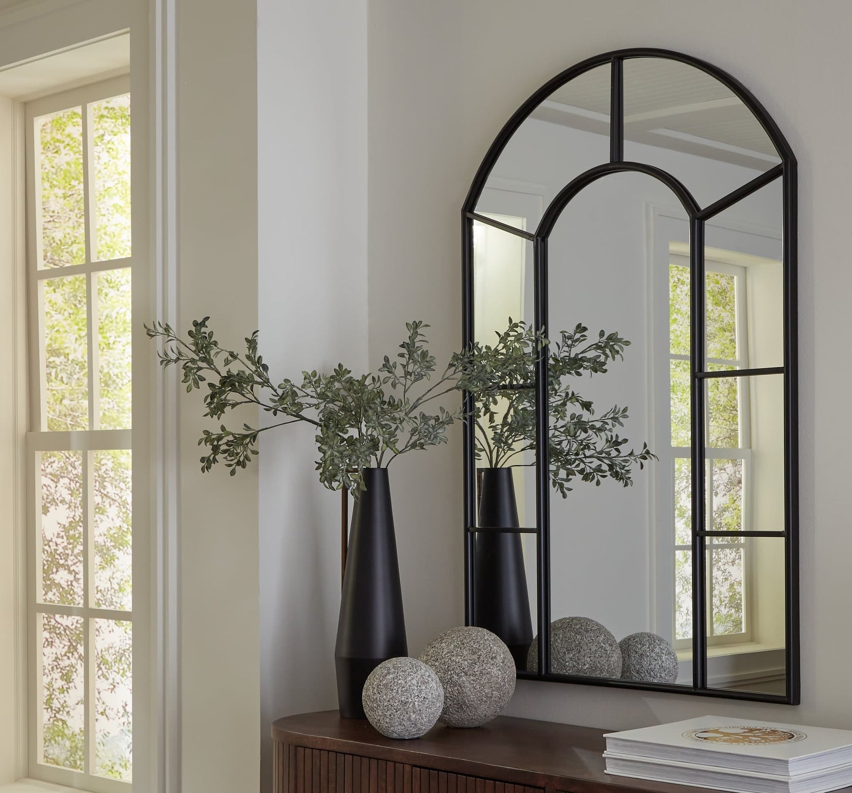 Evengton Black Metal Accent Mirror, front angled view