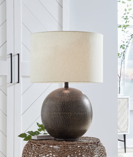 Hambell table lamp with black metal base and goldtone accents on side table
