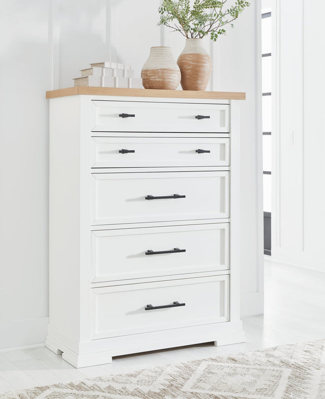 Ashbryn Chest of Drawers in white finish with natural oak top, front angle