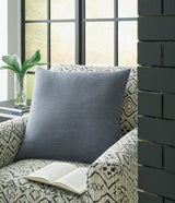 Thaneville Blue Pillow showing front woven solid design