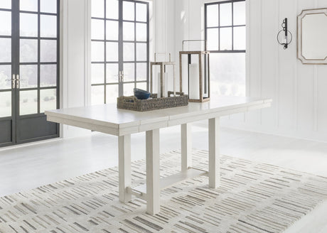 Robbinsdale Antique White Counter Height Dining Extension Table angled view