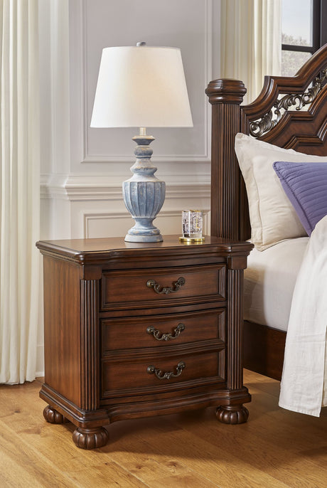 Lavinton Brown Nightstand front angle with drawers closed