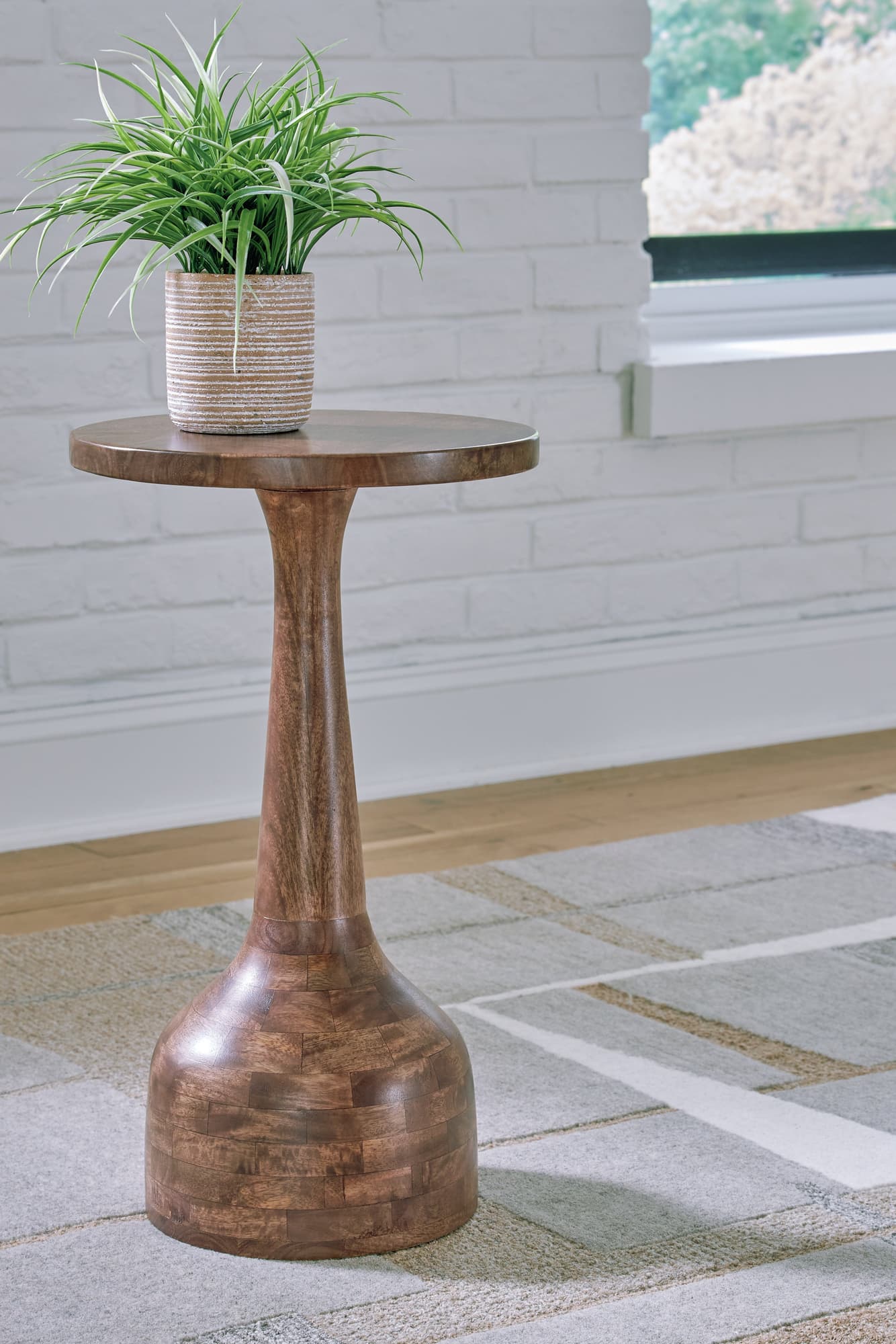 Joville Medium Brown Round Accent Table front angle
