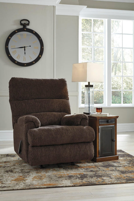 Earth fabric recliner angled view showing reclined position