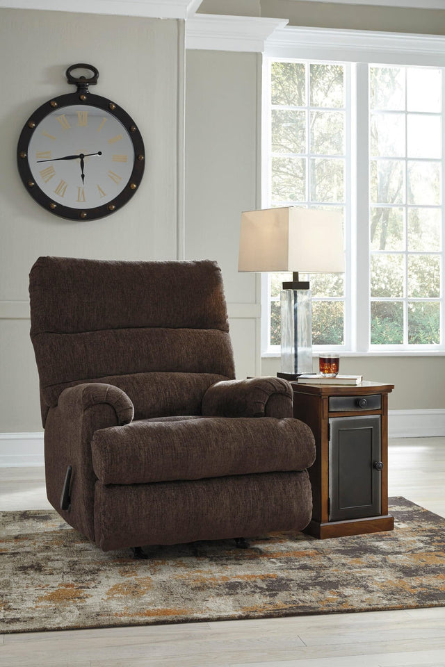Earth fabric recliner angled view showing reclined position