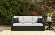 Beachcroft outdoor sofa black frame with light gray cushions, angled side view