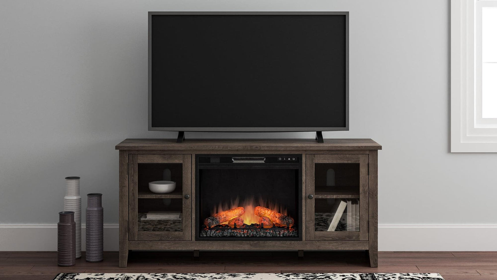 Arlenbry Gray TV Stand with fireplace and glass doors front view