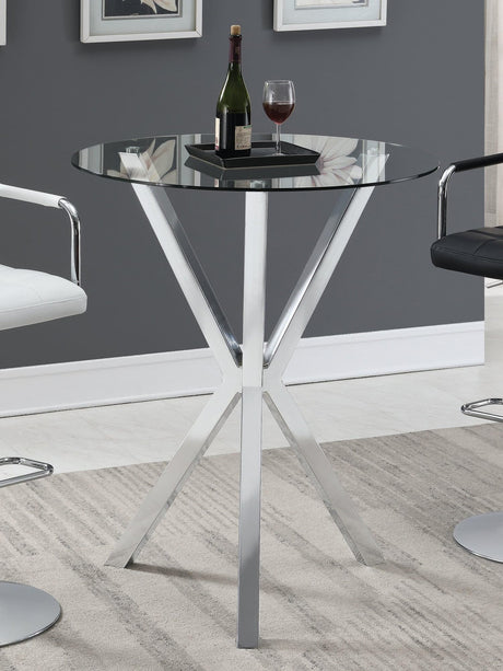 Denali Round Chrome Bar Table with clear glass top, angled view
