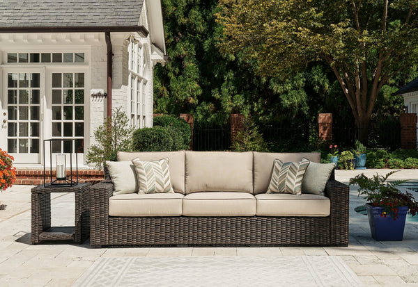 Coastline Bay brown outdoor sofa angled view