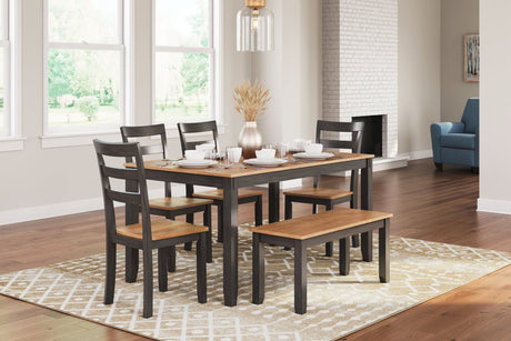 Gesthaven dining table with natural mango butcher block top and tapered legs