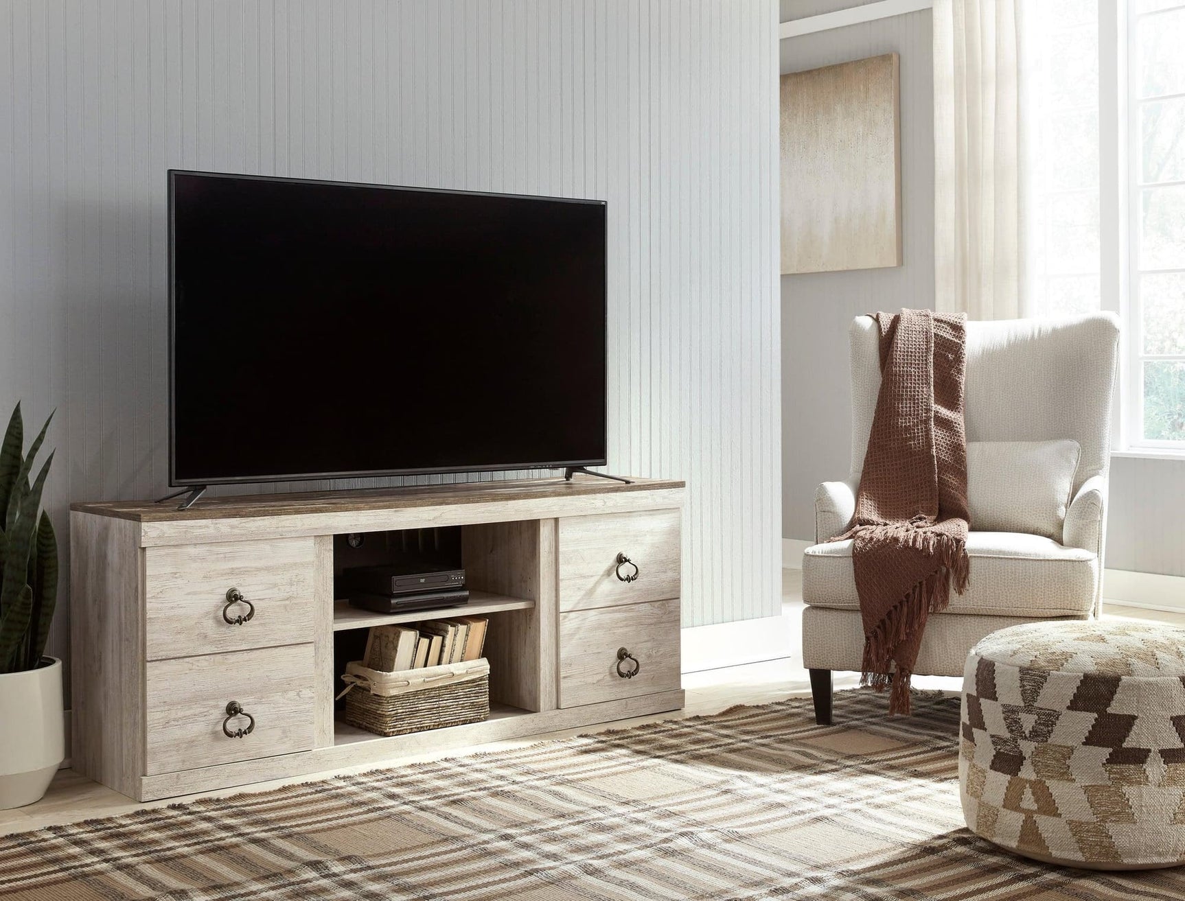 Willowton White solid wood TV stand front view with cabinet doors closed