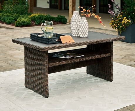 Brook Ranch brown outdoor multi-use table front angle showing wicker surface
