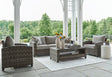 Oasis Court gray outdoor sofa with cushions front view