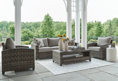 Oasis Court gray outdoor sofa with cushions front view