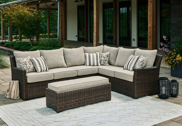 Brook Ranch brown outdoor sofa sectional and bench set with cushions, angled view