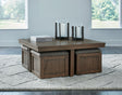 Boardernest brown square coffee table with 4 upholstered stools angled view