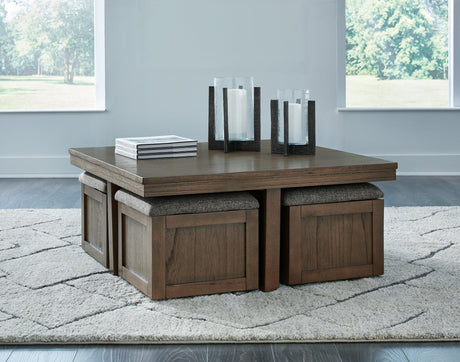 Boardernest brown square coffee table with 4 upholstered stools angled view