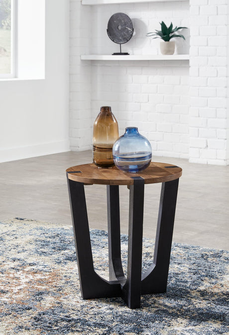 Hanneforth round end table with light brown mango wood top and black angled legs