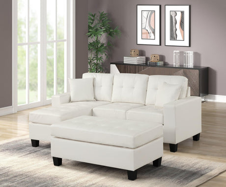 Naomi white faux leather sectional sofa side view with reversible chaise and ottoman