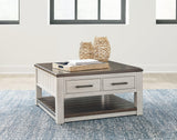 Darborn Gray and brown lift-top coffee table, front angle