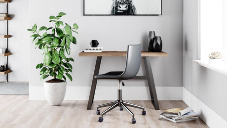Arlenbry Small Desk front view showing weathered oak grain top and black frame