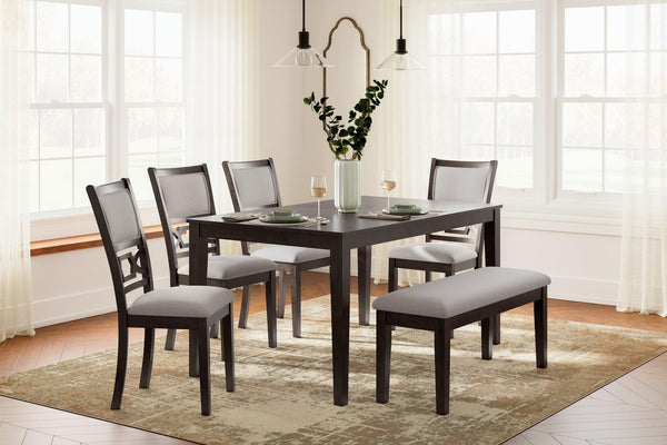 Langwest brown rectangular dining table with tapered legs, side angle view