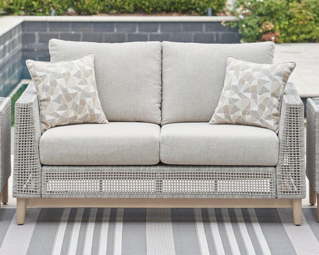 Seton Creek gray outdoor loveseat with cushion front angle