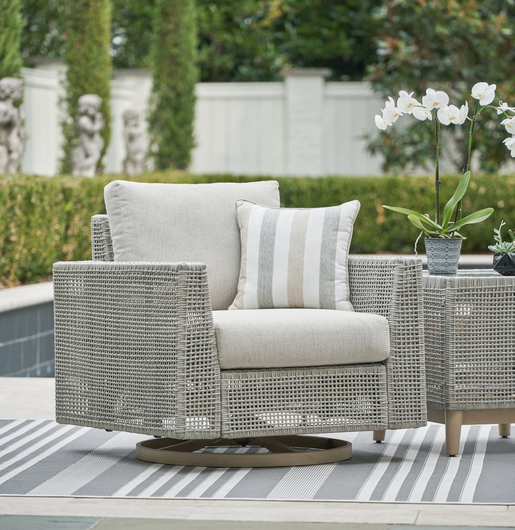 Seton Creek gray outdoor swivel lounge chair front angle
