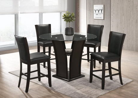 Orlo dining set main view showing round glass top table and four black faux leather chairs