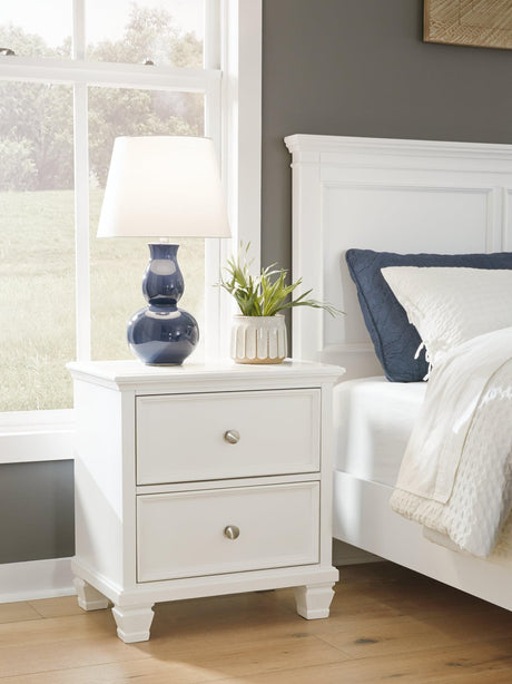 Fortman White Nightstand front view with closed drawers
