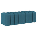 Summer accent bench upholstered in peacock blue tufted fabric, angled view