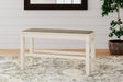 Bolanburg two-tone counter height dining bench angled side view