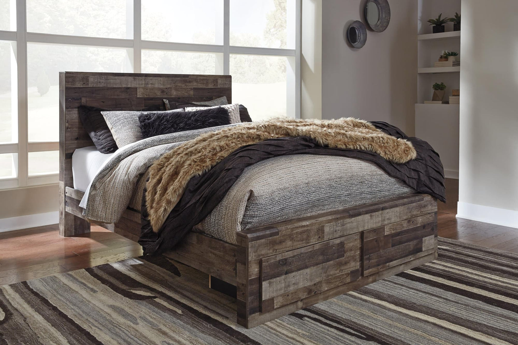 Derekson Multi Gray Queen Panel Bed front view showing headboard and storage drawers