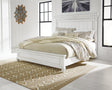 Kanwyn Whitewash King Panel Bed front angle with headboard and footboard
