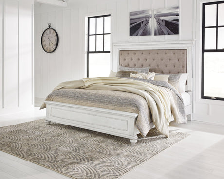 Kanwyn Whitewash Queen Upholstered Panel Bed front angle view
