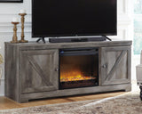 Wynnlow Gray 63 inch TV Stand with electric fireplace angled view