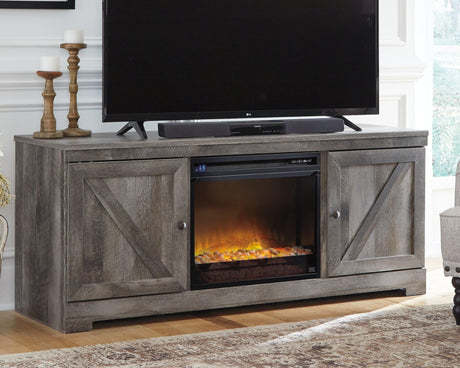 Wynnlow Gray 63 inch TV Stand with electric fireplace angled view