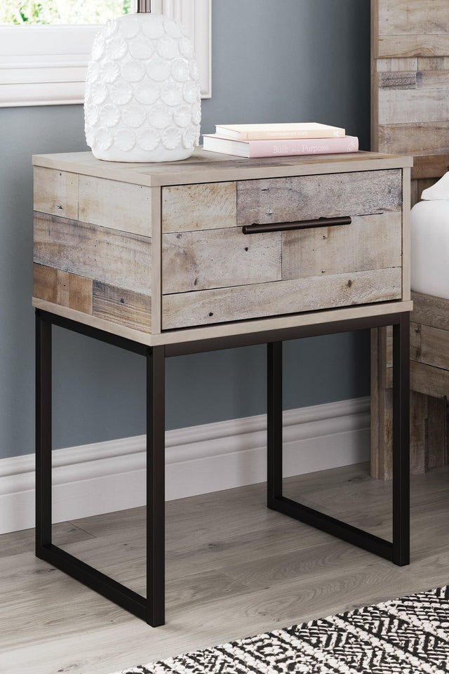 Neilsville Whitewash Nightstand angled front view