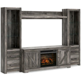 Wynnlow Gray 4-Piece Entertainment Center with Electric Fireplace front view showing TV stand and fireplace