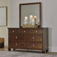 Danabrin brown dresser with attached mirror, front angle view