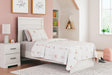 Front angle of Stelsie White Twin Panel Bed showing plank-style headboard
