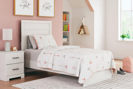 Front angle of Stelsie White Twin Panel Bed showing plank-style headboard
