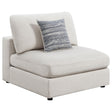 Serene beige upholstered armless chair angled front view