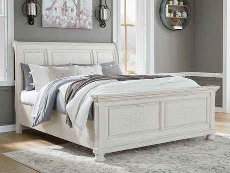 Robbinsdale Antique White King Sleigh Bed in front angle view