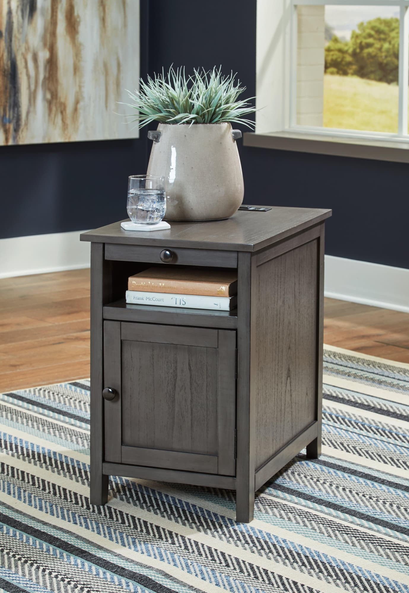 Treytown Gray Chairside End Table front view with closed door