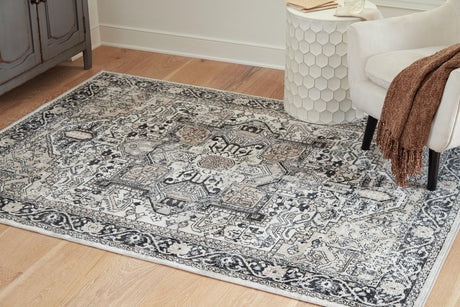 Gregmoore Multi 5'2" x 6'10" rug laid flat showing medallion pattern