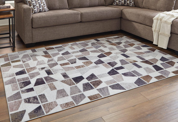 Jettner Multi 5x7 area rug with geometric abstract design