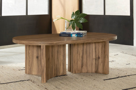 Austanny Cocktail Table front angle in warm brown finish
