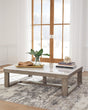 Loyaska Coffee Table angled view showing brown wood-tone base and ivory marble top