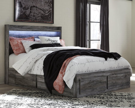 Baystorm Gray Queen Panel Bed front view showing headboard and storage drawers